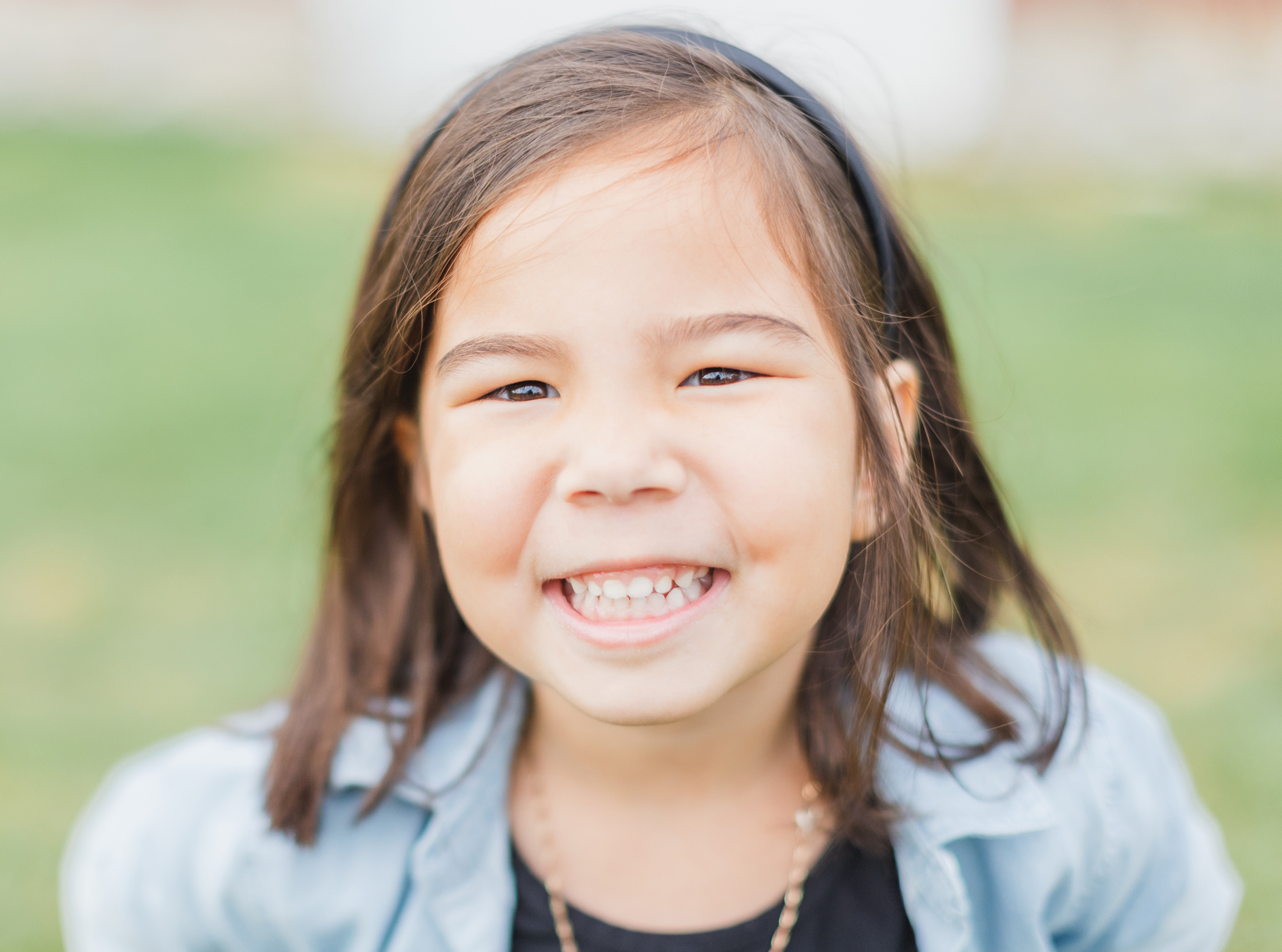 St. Charles, IL. LeRoy Oaks Forest Preserve. Close up portrait of the oldest daughter.