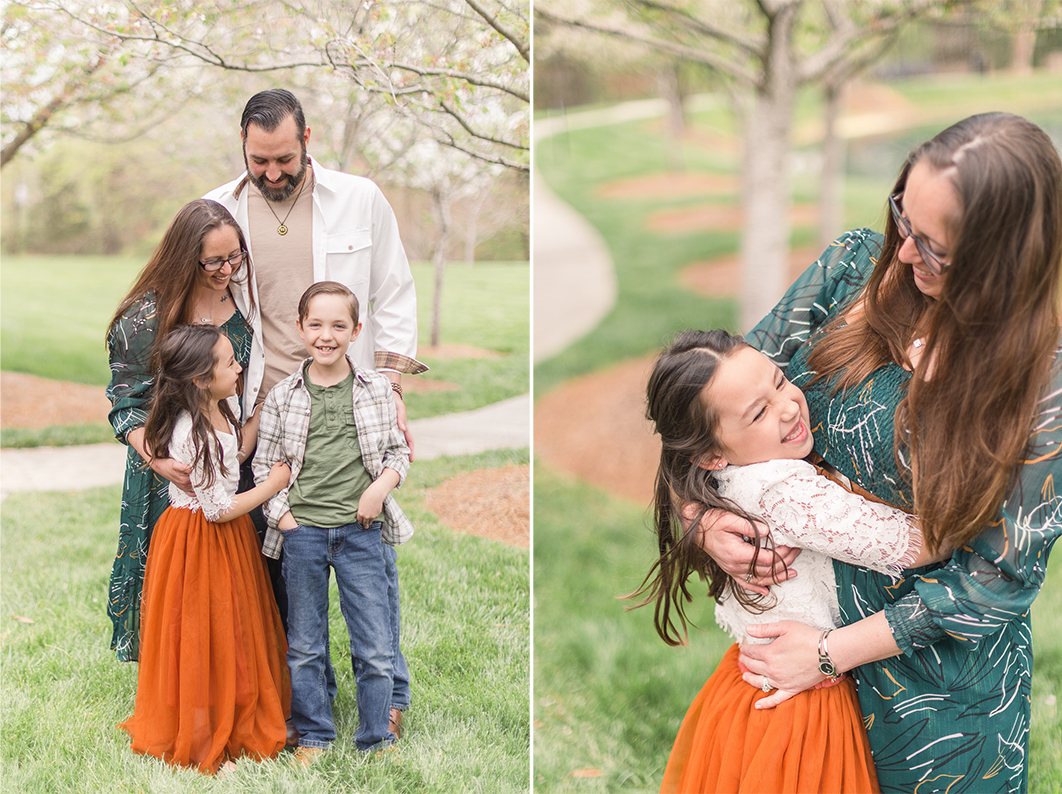 Family photo during our charlotte spring minis at Ballantyne NC. Son and daughter are standing in front of mom and dad, ho are looking at each other. Daughter is hugging mom and laughing