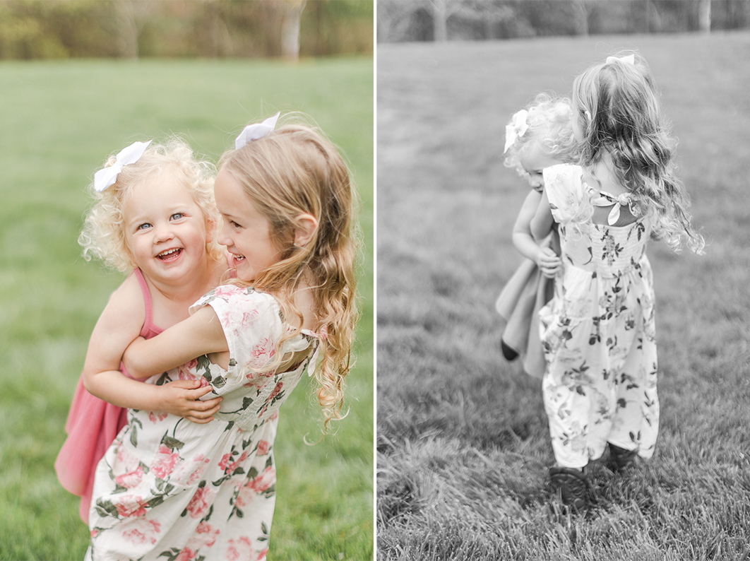 Sisters are hugging each other, while the older sister is carrying her younger sister. Both are laughing and enjoying each other during a family spring session